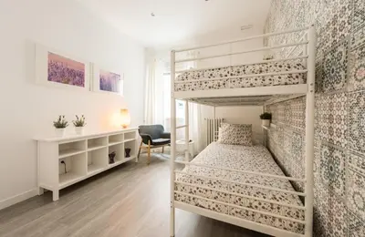 Cama o camas de una habitación en Apartamento en Chamberí