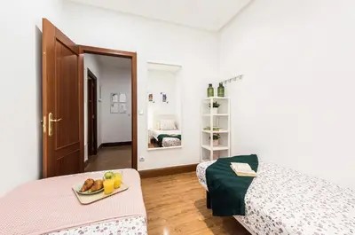 Cama o camas de una habitación en Apartamento totalmente equipado en el centro de Madrid