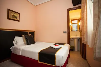 Cama o camas de una habitación en CH Chelo