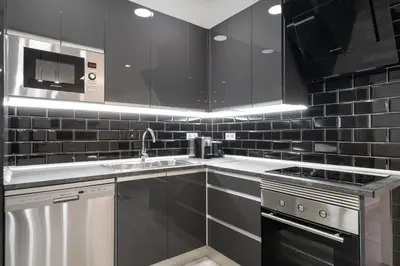 Una cocina o zona de cocina en Plaza España Apartment