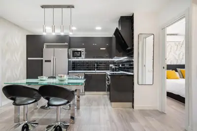 Una cocina o zona de cocina en Plaza España Apartment