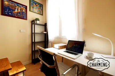 Una televisión o centro de entretenimiento en Plaza Mayor - Exclusivo Apartamento Dúplex