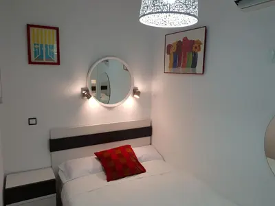 Cama o camas de una habitación en CENTRO ATOCHA Corta ESTANCIA, NO TURISTICO