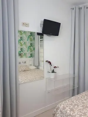 Cama o camas de una habitación en Hostal Casa Chueca