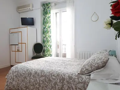 Cama o camas de una habitación en Hostal Casa Chueca