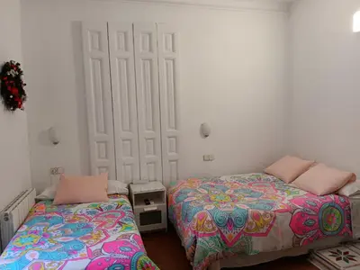 Cama o camas de una habitación en Hostal Casa Chueca
