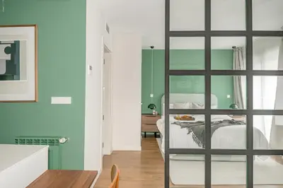 Cama o camas de una habitación en Home Art Apartments Salamanca