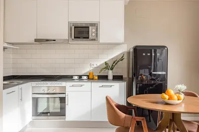 Una cocina o zona de cocina en Home Art Apartments Salamanca