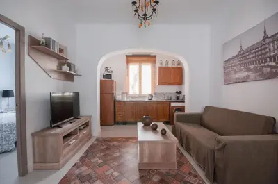 Una televisión o centro de entretenimiento en Apartamento 6 Mirasierras
