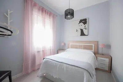 Cama o camas de una habitación en Apartamento 6 Mirasierras