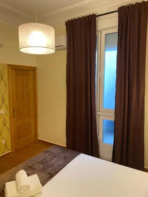 Cama o camas de una habitación en Hostal Alaska