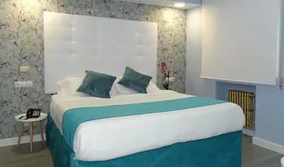 Cama o camas de una habitación en Hotel Mexico