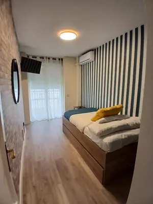 Cama o camas de una habitación en Hotel Mexico