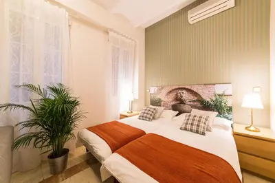 Cama o camas de una habitación en El Jardín del Ángel Yolka