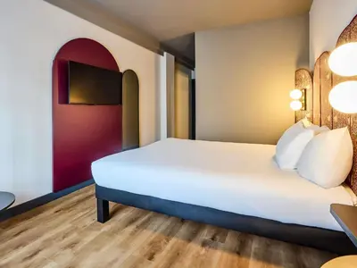 Cama o camas de una habitación en Ibis Styles Madrid Centro Maravillas