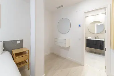 Cama o camas de una habitación en Apartamentos Madrid