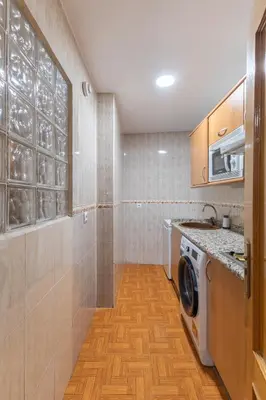 Una cocina o zona de cocina en Apartamentos Madrid