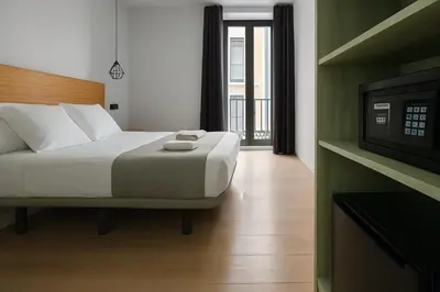 Cama o camas de una habitación en CH Lemon Rooms - Madrid