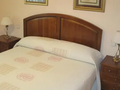 Cama o camas de una habitación en Hostal Gonzalo