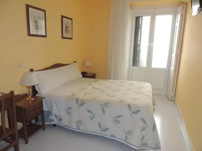 Cama o camas de una habitación en Hostal Gonzalo