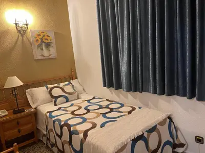 Cama o camas de una habitación en Hostal Sonsoles Madrid-Centro