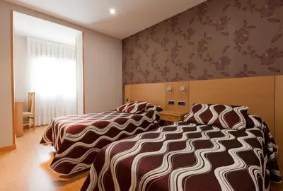 Cama o camas de una habitación en Hostal Jemasaca-Palma61