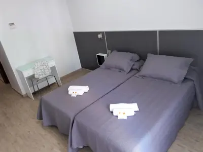 Cama o camas de una habitación en Hostal Jemasaca-Palma61
