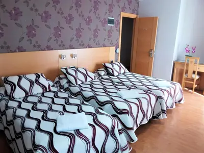 Cama o camas de una habitación en Hostal Jemasaca-Palma61