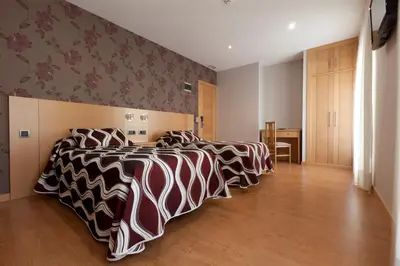 Cama o camas de una habitación en Hostal Jemasaca-Palma61