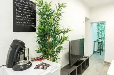 Una televisión o centro de entretenimiento en Apartamento Tirso de Molina