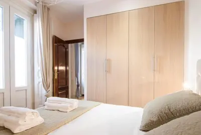 Cama o camas de una habitación en Refurbished spacious 2BD 2BTH - Malasaña