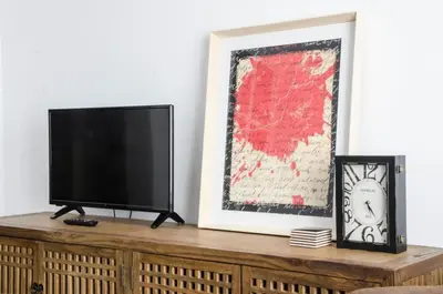 Una televisión o centro de entretenimiento en Bright Cozy 2BD 2BTH with Balcony - Chueca
