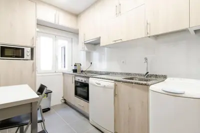 Una cocina o zona de cocina en Bright Modern 3BD - Barrio de las Letras