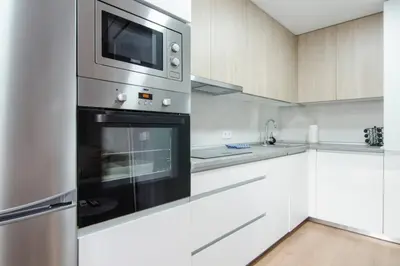 Una cocina o zona de cocina en Bright Cozy with Awesome views - City centre