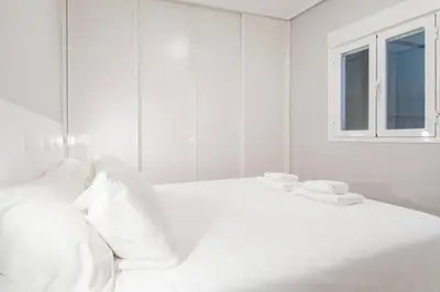 Cama o camas de una habitación en Bright Cozy with Awesome views - City centre