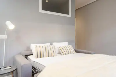 Cama o camas de una habitación en Bright Cozy with Awesome views - City centre