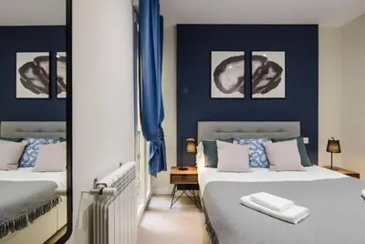 Cama o camas de una habitación en Design apartment in Madrids Downtown - 3BD 2BT