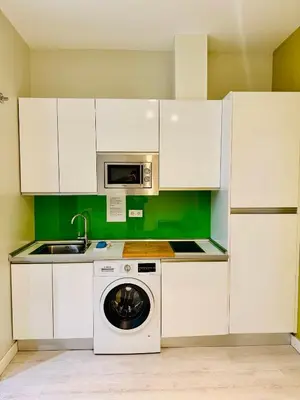 Una cocina o zona de cocina en Apartamentos Apolo