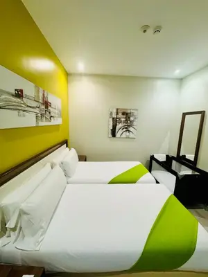 Cama o camas de una habitación en Apartamentos Apolo