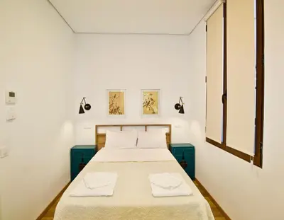 Cama o camas de una habitación en The Bridge Huertas - Hostal