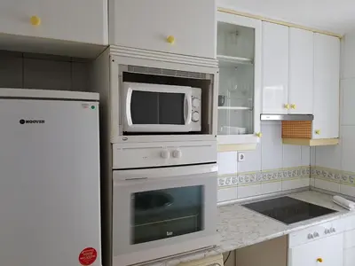 Una cocina o zona de cocina en Pradera San Isidro 1
