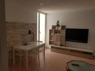 Una televisión o centro de entretenimiento en Pradera San Isidro 1