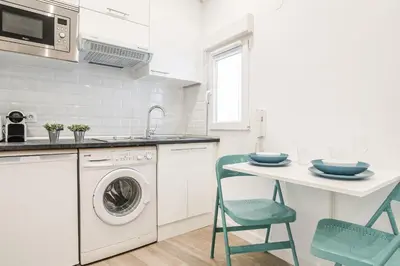 Una cocina o zona de cocina en Waou Malasaña I - Alquiler Corta Duración