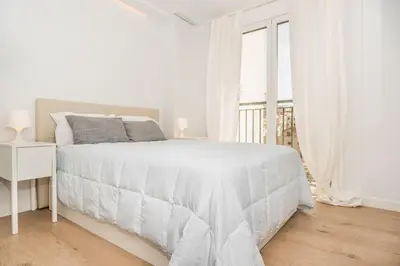 Cama o camas de una habitación en Waou Plaza de España VII - Alquiler Corta Duración