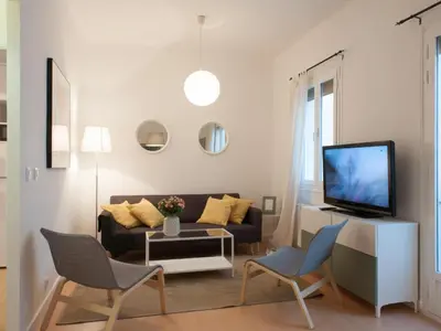 Una televisión o centro de entretenimiento en Montaber Apartments - La Paz Market
