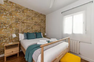 Cama o camas de una habitación en Waou La Latina II - Alquiler Corta Duración