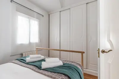 Cama o camas de una habitación en Waou La Latina II - Alquiler Corta Duración