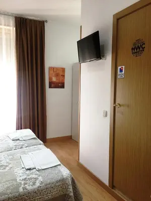 Cama o camas de una habitación en Alojamiento Jaén