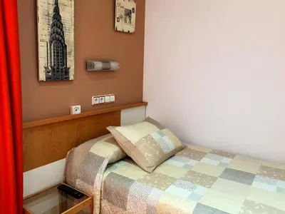 Cama o camas de una habitación en Alojamiento Jaén