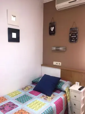 Cama o camas de una habitación en Alojamiento Jaén
